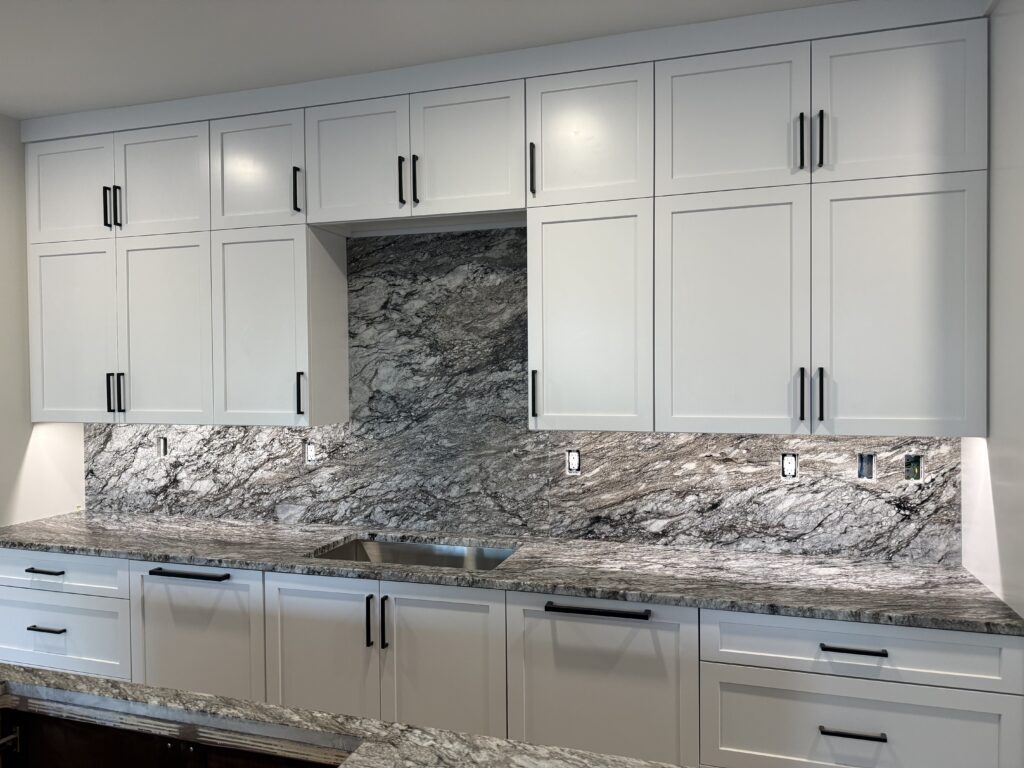 leathered quartzite countertops kitchen design organic natural stone wood cabinetry matte hardware