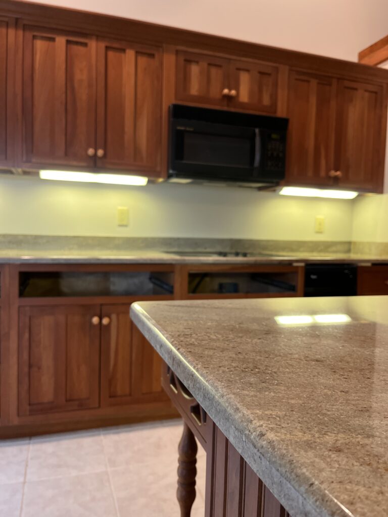 Astoria granite countertops close-up 3CM thickness edge profile cream base chocolate veining natural stone