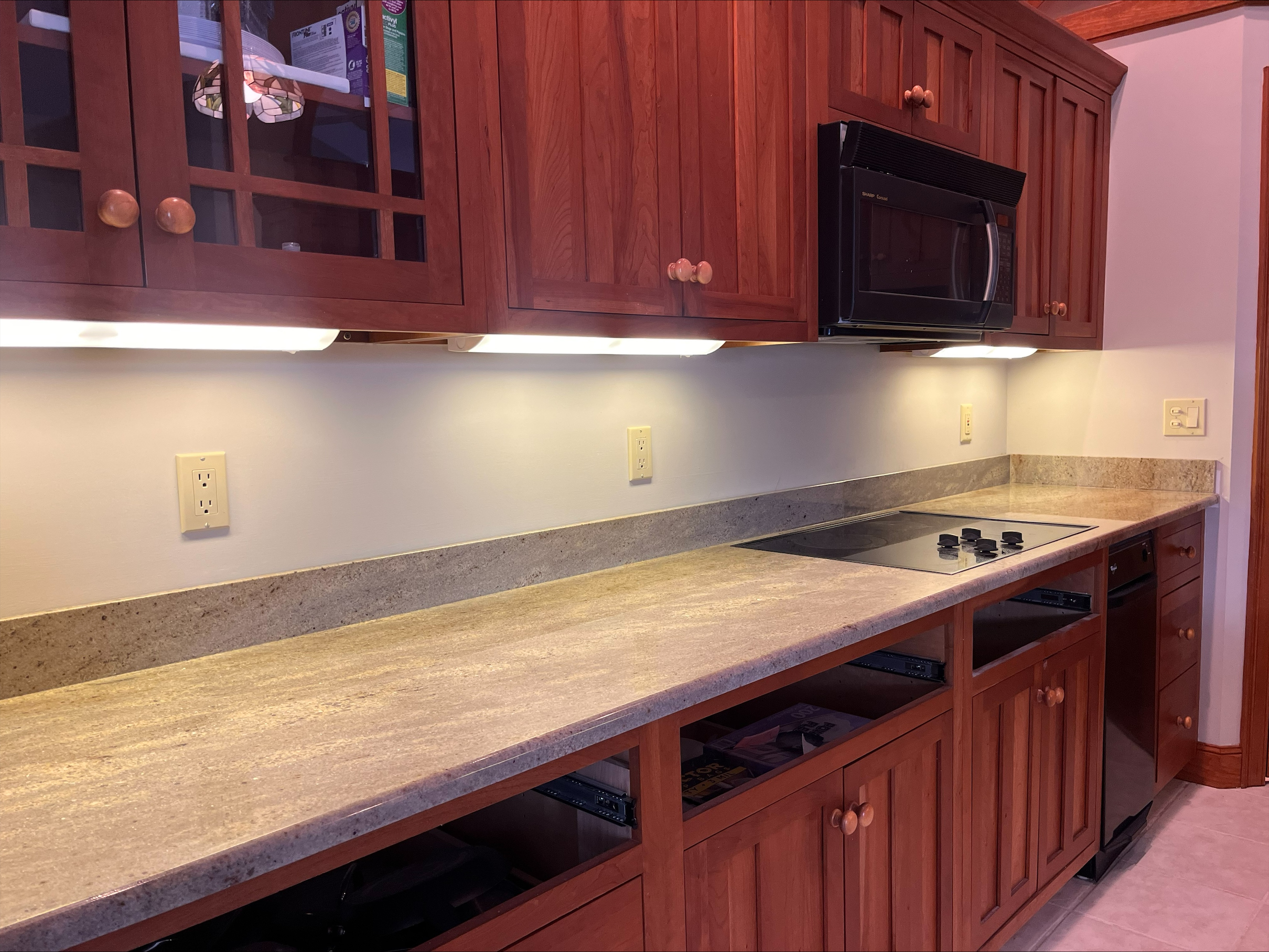 Astoria granite countertops installed kitchen warm cream chocolate veining 3CM finished edge
